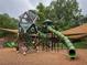 Modern playground structure with slides, climbing features, and shade canopies at 331 Gordon Ne Ave, Atlanta, GA 30307