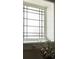 Close-up of window with decorative glass and white trim, adding architectural interest at 331 Gordon Ne Ave, Atlanta, GA 30307