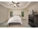 Spacious bedroom with trey ceilings, comfortable king-sized bed, and neutral color palette at 332 Red Fox Dr, Canton, GA 30114