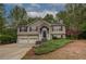 Charming two-story home boasting a manicured front lawn and inviting entrance at 332 Red Fox Dr, Canton, GA 30114