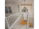 Inviting foyer with staircase, high ceilings, and natural light streaming in from large windows at 332 Red Fox Dr, Canton, GA 30114