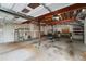 Spacious garage features ample storage and workbench, ready for projects and organization at 332 Red Fox Dr, Canton, GA 30114