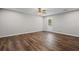 Spacious bedroom featuring hardwood floors and a ceiling fan at 2035 Mountain Rd, Cumming, GA 30040
