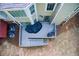 Aerial view of the home's backyard featuring a wooden deck, grill, and two AC units at 376 Eagle Tiff Dr, Sugar Hill, GA 30518