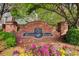 Fairview Park community entrance sign surrounded by colorful flowers and lush greenery at 376 Eagle Tiff Dr, Sugar Hill, GA 30518