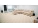 Finished basement with a large sectional sofa and a ping pong table at 4015 Dodds Grove Ln, Alpharetta, GA 30009