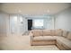 Finished basement with a ping pong table and a comfortable sectional sofa at 4015 Dodds Grove Ln, Alpharetta, GA 30009