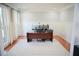 Bright office featuring a large desk, natural light, and neutral décor creating an ideal work-from-home space at 4015 Dodds Grove Ln, Alpharetta, GA 30009