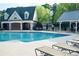 Community pool features inviting pool deck with lounge chairs and well-kept amenities at 4015 Dodds Grove Ln, Alpharetta, GA 30009