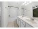 Bathroom featuring a double vanity and shower-tub combination at 5589 Trace Views Dr, Norcross, GA 30071