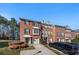 Attractive brick townhome with manicured landscaping and private garage at 5589 Trace Views Dr, Norcross, GA 30071