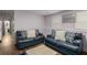 Finished basement area with sofas and a soft rug at 6547 Demere Dr, Morrow, GA 30260