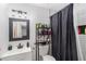 Modern bathroom with white subway tile shower and updated vanity at 6547 Demere Dr, Morrow, GA 30260