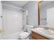 This bathroom has a shower and tub, a sink vanity, and a toilet at 1095 Athena Ct, Acworth, GA 30101