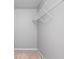 A large walk-in closet features a wire rack shelf for ample clothing and storage space at 1095 Athena Ct, Acworth, GA 30101