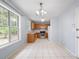 Bright kitchen with ample cabinet space, stainless steel appliances, and tile flooring at 1095 Athena Ct, Acworth, GA 30101