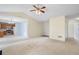 Open floor plan connecting the kitchen and living room, featuring vaulted ceilings at 1095 Athena Ct, Acworth, GA 30101