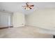 Spacious living room with neutral carpet, vaulted ceiling, and plenty of natural light at 1095 Athena Ct, Acworth, GA 30101