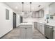Kitchen with white countertops, gray cabinets, and an island with a white countertop at 1477 Olive Sw St, Atlanta, GA 30310