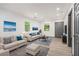 Comfortable living room with neutral tones and plenty of natural light at 1477 Olive Sw St, Atlanta, GA 30310