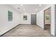 Living room space shows natural light and new flooring at 1477 Olive Sw St, Atlanta, GA 30310