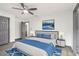 Spacious main bedroom with a ceiling fan and ensuite bathroom at 1477 Olive Sw St, Atlanta, GA 30310