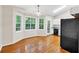 Dining area features wood floors, bright windows and access to kitchen at 2539 Lakeside Dr, Villa Rica, GA 30180