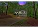 Charming home with attached garage and well-maintained front yard at 2539 Lakeside Dr, Villa Rica, GA 30180