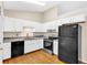 Kitchen featuring white cabinets and stainless steel appliances at 2539 Lakeside Dr, Villa Rica, GA 30180
