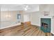 Spacious room features wood flooring and fireplace with decorative green marble surround at 2539 Lakeside Dr, Villa Rica, GA 30180
