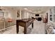 Spacious finished basement with a foosball table, wet bar, and plenty of seating for entertaining guests at 5475 Trowbridge Dr, Dunwoody, GA 30338