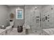 Elegant bathroom with luxurious walk-in shower and custom marble vanity and fixtures at 5475 Trowbridge Dr, Dunwoody, GA 30338
