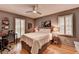 Comfortable bedroom featuring a cozy bed, desk area, and a neutral color palette for a relaxing atmosphere at 5475 Trowbridge Dr, Dunwoody, GA 30338