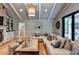 Spacious living area with fireplace, built-in shelving, and comfortable seating arrangement at 5475 Trowbridge Dr, Dunwoody, GA 30338