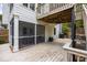 Multi-level backyard deck with screened in porch, perfect for entertaining and outdoor activities at 6000 Hampton Bluff Way, Roswell, GA 30075