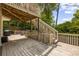 Large backyard deck with multiple levels and staircase, offering ample space for outdoor activities at 6000 Hampton Bluff Way, Roswell, GA 30075
