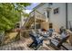 Spacious backyard deck with multiple seating areas, perfect for outdoor gatherings and relaxation at 6000 Hampton Bluff Way, Roswell, GA 30075