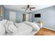 Spacious bedroom features hardwood floors, natural light, creating a serene and inviting atmosphere at 6000 Hampton Bluff Way, Roswell, GA 30075
