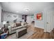 Comfortable living room with a neutral color palette, a cozy sofa, and an exercise bike for added convenience at 6000 Hampton Bluff Way, Roswell, GA 30075