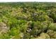 Lush tree canopy surrounds this home in a wooded lot at 6525 Old Riverside Nw Dr, Sandy Springs, GA 30328