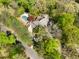 A lush, wooded lot surrounds this home with a pool and manicured landscaping at 6525 Old Riverside Nw Dr, Sandy Springs, GA 30328