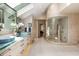 Elegant bathroom showcasing double sinks, glass-enclosed shower, and modern finishes, creating a luxurious space at 6525 Old Riverside Nw Dr, Sandy Springs, GA 30328