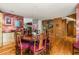 Charming dining room showcasing hardwood floors, decorative walls, and seamless connectivity to the staircase and living spaces at 6525 Old Riverside Nw Dr, Sandy Springs, GA 30328