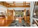 Grand foyer with soaring ceilings, wood accents, spiral staircase, and unique tile flooring creating a striking entrance at 6525 Old Riverside Nw Dr, Sandy Springs, GA 30328
