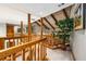 Upper hallway with wood trim and a view of downstairs at 6525 Old Riverside Nw Dr, Sandy Springs, GA 30328