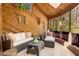 Cozy sunroom with comfortable seating, wooden accents, and large windows with a view of nature at 6525 Old Riverside Nw Dr, Sandy Springs, GA 30328