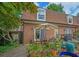 Brick home with a backyard patio surrounded by lush landscaping at 1261 Lavista Rd # N4, Atlanta, GA 30324