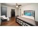 Comfortable bedroom showcasing hardwood floors, a modern bed frame, and soft, natural lighting at 1261 Lavista Rd # N4, Atlanta, GA 30324