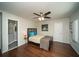 Inviting bedroom featuring hardwood floors, soft lighting, and a door that leads to the bathroom at 1261 Lavista Rd # N4, Atlanta, GA 30324