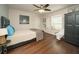Serene bedroom featuring hardwood floors, a cozy window seat, and a minimalist aesthetic at 1261 Lavista Rd # N4, Atlanta, GA 30324